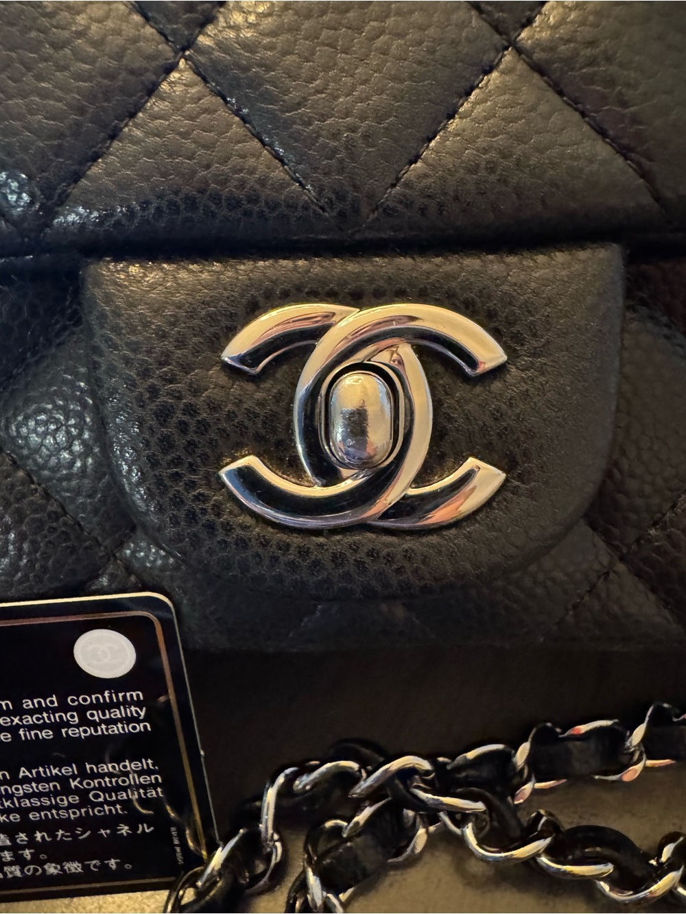 CHANEL Black Quilted Caviar Leather Mini Flap Crossbody with Silver Hardware - Picture 2 of 10